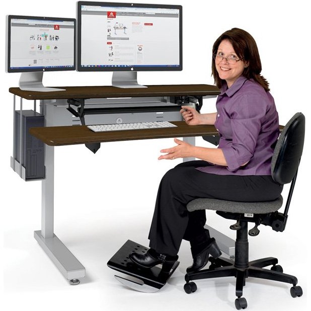 Joy in Customer Service moves her front worksurface lower and higher than the back worksurface for total comfort, sitting or standing.