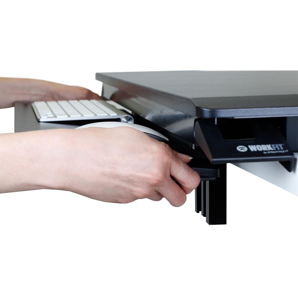 Keyboard tray raises and lowers 3" (6.2 cm)