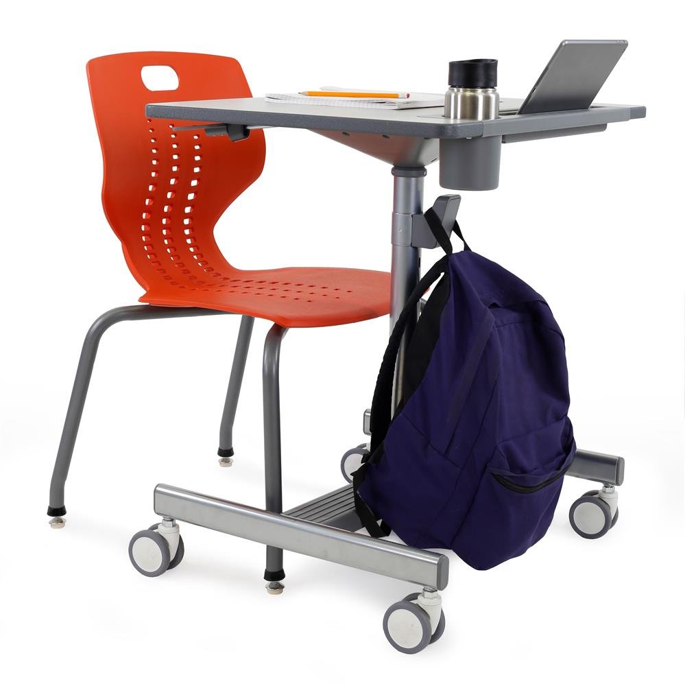 LearnFit can be easily adjusted between their sitting and standing heights, with a standard-height student chair being used for seating