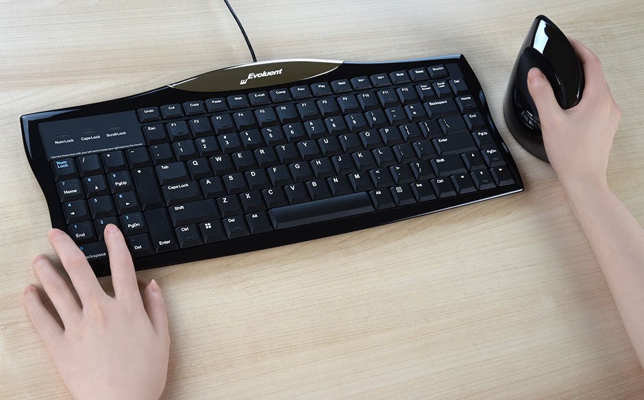 The left side navigation and numeric keys may be operated with your left hand to reduce reaching for them while using a right-hand mouse.
