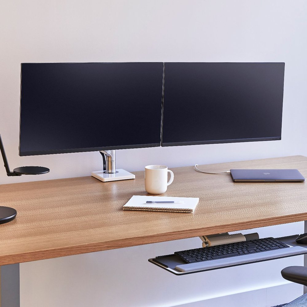 Humanscale M8.1 supports a better working posture, creates more usable desktop space and helps maintain a clutter-free environment