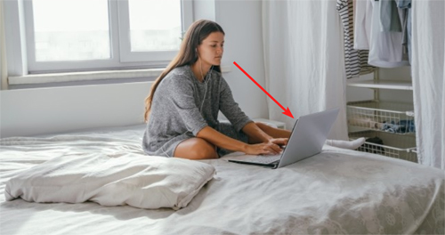 Neck / Back pain looking down at your laptop on your bed?