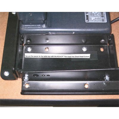 Secure the spacer to the table top with the #12x3/4