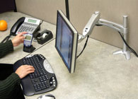 Ergotron 45-179-194 LX Desk Mount LCD Arm Silver inuse picture