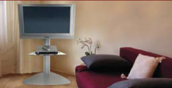 Inused image of Peerless SGLB01 SmartMount Flat Panel TV Stand with one Shelf
